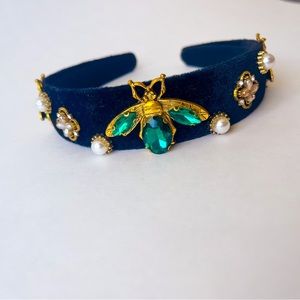 Black and green handmade padded headband with pearl and jewel embellishments